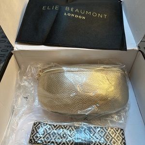 Elie Beaumont GOLD sling bag comes with a gold strap and a knitted diamond strap